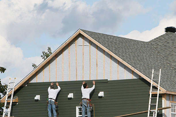 Professional Emergency Siding Repair technician working in Plainview, MN